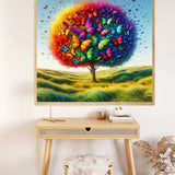 Paint by Numbers - Tree of Butterfly Friends art piece, colorful tree with butterfly leaves in warm sunset and cool deep-sea hues above desk