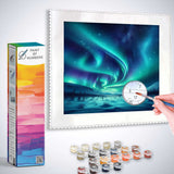 Paint by Numbers kit featuring Northern Lights Wonderland scene with turquoise and green auroras over a snowy landscape.