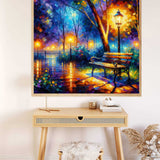 AB Diamond Painting - Light show with bench; Paint by Numbers kit with colorful park scene, bench, and lamppost on wall above desk