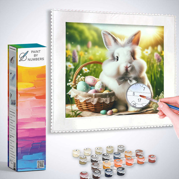 Paint by Numbers kit featuring a pastel artwork of a bunny with a basket of Easter eggs in a blooming spring meadow.