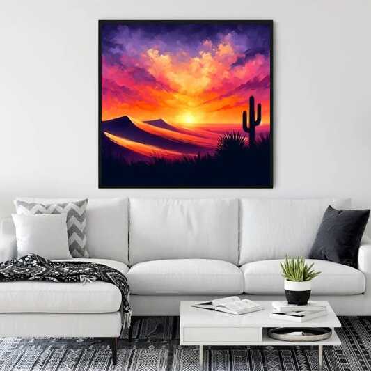 Paint by Numbers "Desert Sky Flame" artwork featuring a vibrant desert sunset with warm reds, oranges, purples, and silhouetted cacti displayed above a white couch.