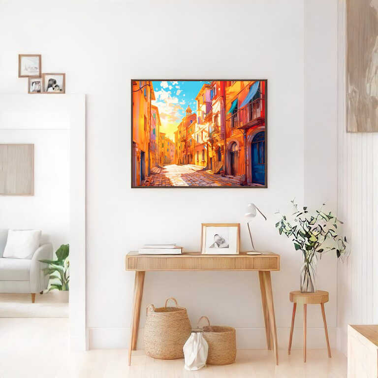 Paint by Numbers artwork titled "Mediterranean Sun Tide" hanging in a bright room, featuring vibrant Mediterranean street with orange tones and golden sunlight.