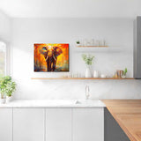 Paint by Numbers elephant artwork with bright oranges and reds hangs in a modern white kitchen, adding vibrant color and warmth.