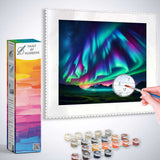 Paint by Numbers kit featuring a Northern Lights Dreamscape with colorful night sky, mountain silhouettes, and painting supplies.