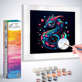 Paint by Numbers kit featuring Cosmic Phoenix painting in neon colors with paint pots and brush against dark background