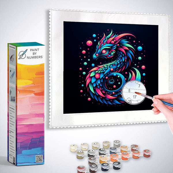 Paint by Numbers kit featuring Cosmic Phoenix painting in neon colors with paint pots and brush against dark background