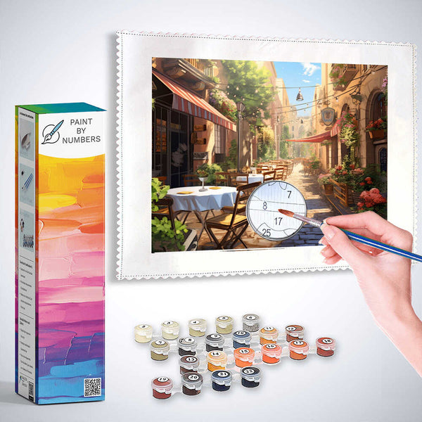 Paint by Numbers kit featuring a sunlit Mediterranean restaurant scene with blooming flowers and terracotta facades.