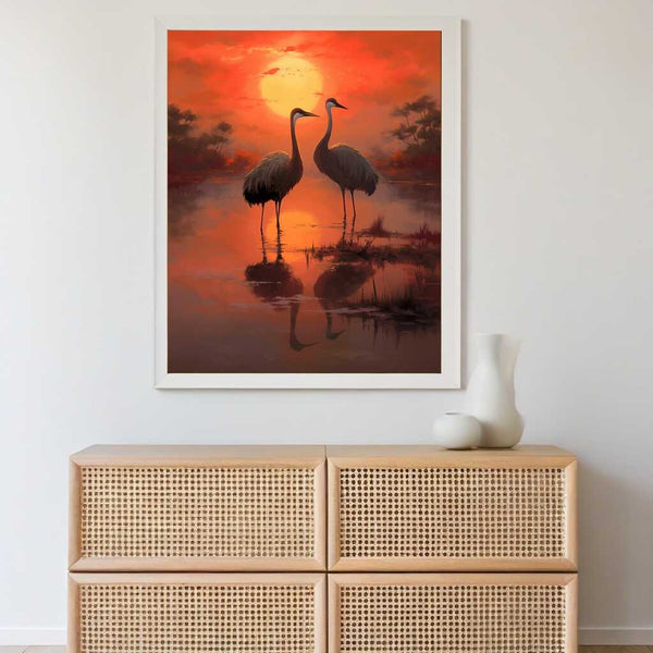 Paint by Numbers - Two cranes at sunset in "Sunset Symphony" reflecting in calm water under a golden-red sky for romantic-impressionistic art.