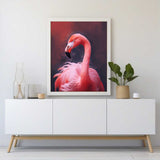 Paint by Numbers kit featuring a realistic, coral-colored flamingo against a sensual red background, showcasing nature's grace and majesty.