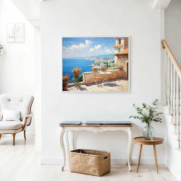 Paint by Numbers Mediterranean Reverie painting of a coastal view with vibrant flowers and sea on a wall in a bright, white room.