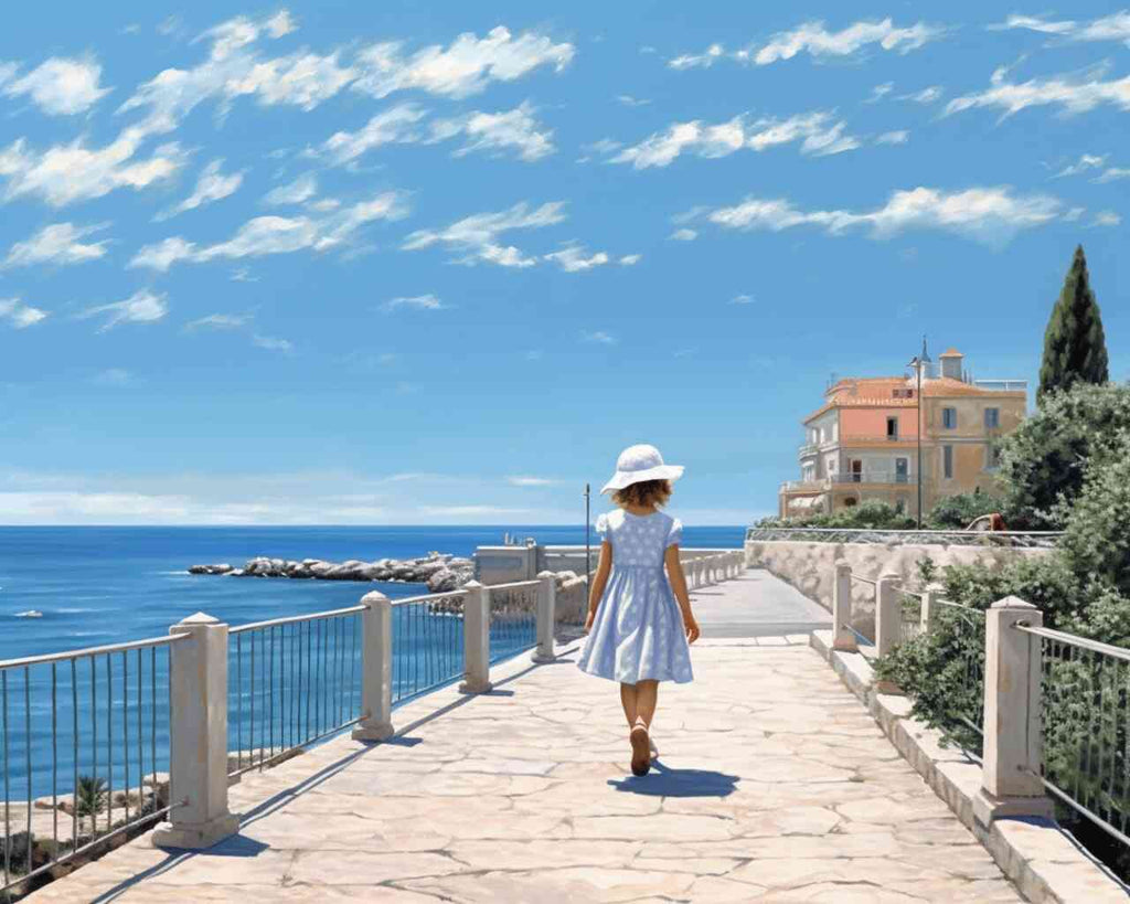 Girl in blue dress and white hat walking on sunlit path by a Mediterranean house with blue sea and clouds in the background - Paint by Numbers