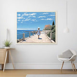 Paint by Numbers - Coastal Whispers artwork featuring a girl in a blue dress and hat walking along a Mediterranean path by the sea.