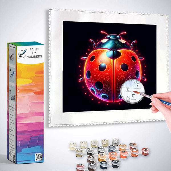 Paint by Numbers kit featuring a colorful ladybug painting with bright red and deep blue tones, complete with paints and brush.