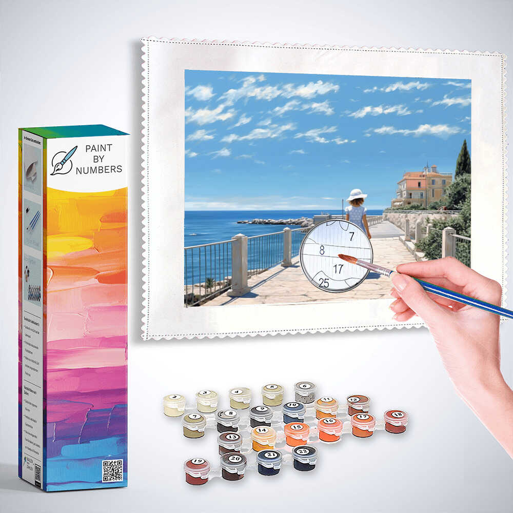 Paint by Numbers kit showing a coastal scene with a girl in a blue dress walking toward a Mediterranean house along a sunlit path.
