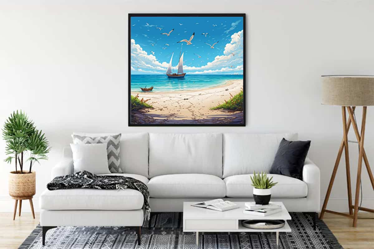 Diamond Painting of Paradise Beach displayed in a modern living room with white sofa, coffee table, and indoor plants.