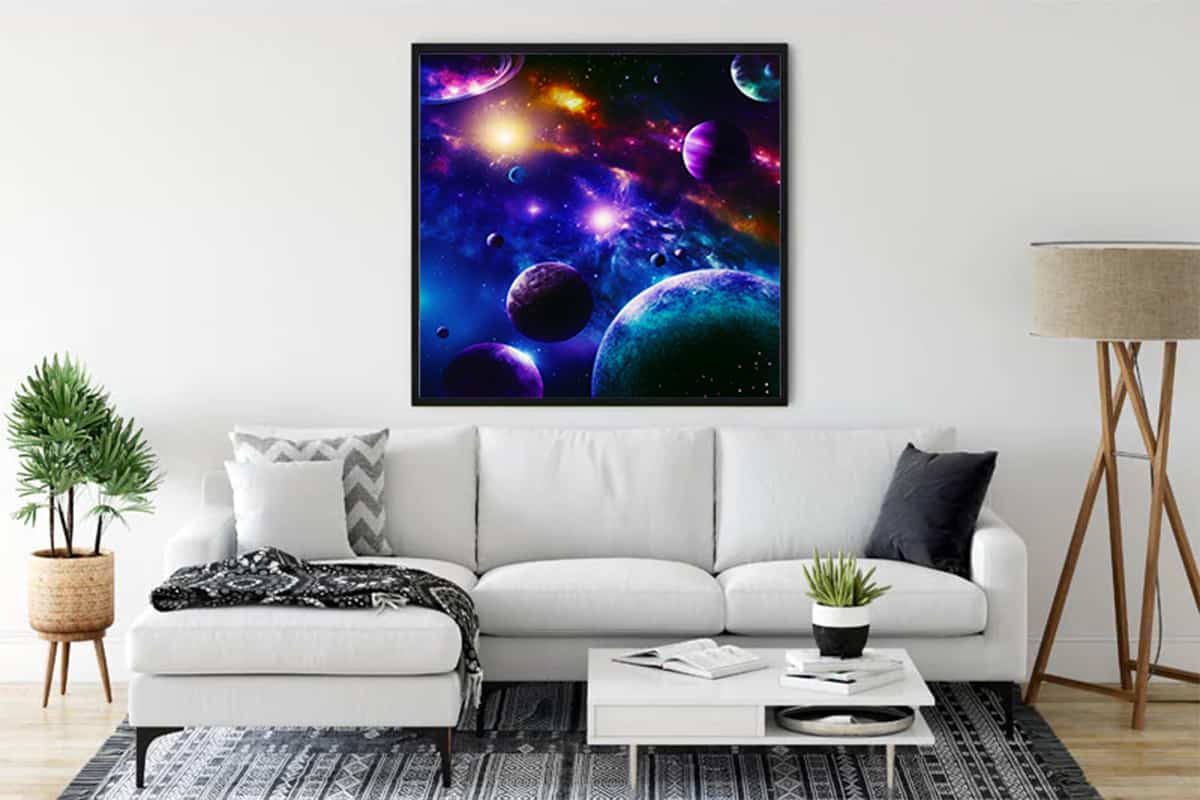 Diamond Painting - Sky Magic hanging in a modern living room, showcasing vibrant space design with planets and galaxies. Paint by Numbers kit.