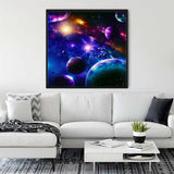 Diamond Painting - Sky Magic hanging in a modern living room, showcasing vibrant space design with planets and galaxies. Paint by Numbers kit.