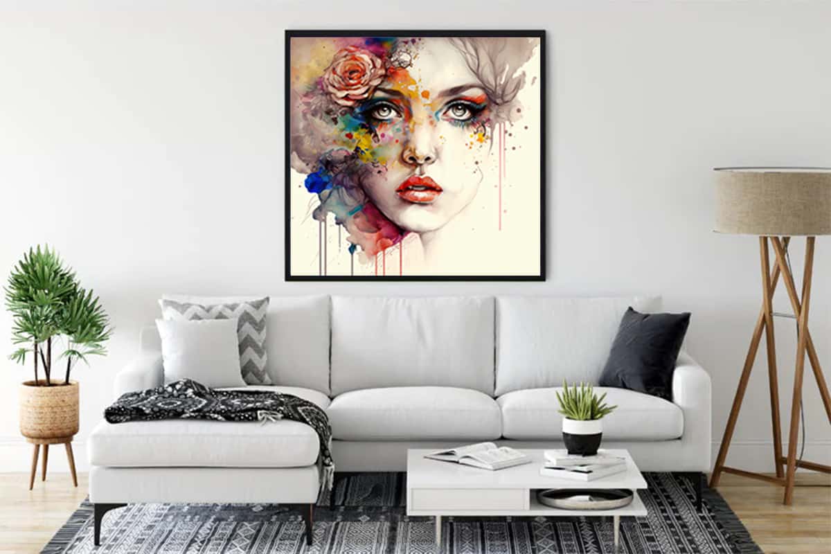 Modern living room with a colorful diamond painting of a woman's face on the wall above a white couch