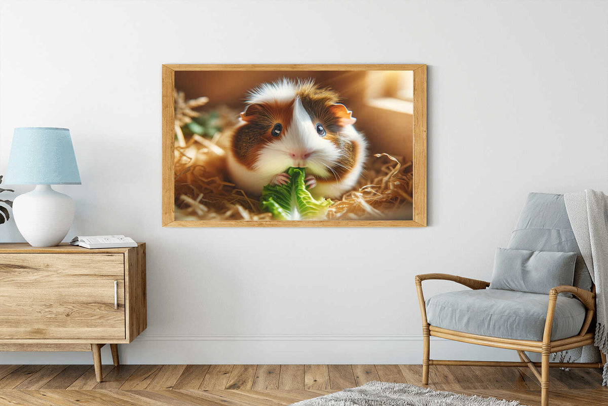 Framed picture of a cute guinea pig eating a leaf, displayed in a modern living room setting.
