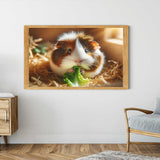 Framed picture of a cute guinea pig eating a leaf, displayed in a modern living room setting.