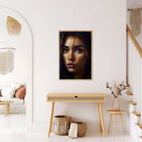Diamond Painting - Model Closeup framed art hanging on a white wall above a wooden console in a minimalist living room.