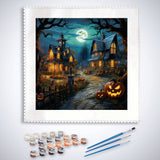 Paint by Numbers - Halloween Nights kit featuring a haunted house scene with pumpkins, glowing moon, and art supplies including paints and brushes.