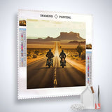 Diamond Painting Kit - Wind in Hair with two motorcyclists on a desert road, complete with Paint by Numbers canvas, acrylic diamonds, tweezers, and pen.
