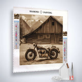 Retro racing motorcycle diamond painting kit with rustic barn and mountain backdrop. Includes canvas, acrylic diamonds, tweezers, and pen.