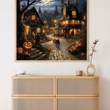 Paint by Numbers - Halloween village mystery artwork displayed on wall above wooden cabinet, with pumpkins and spooky village scene.