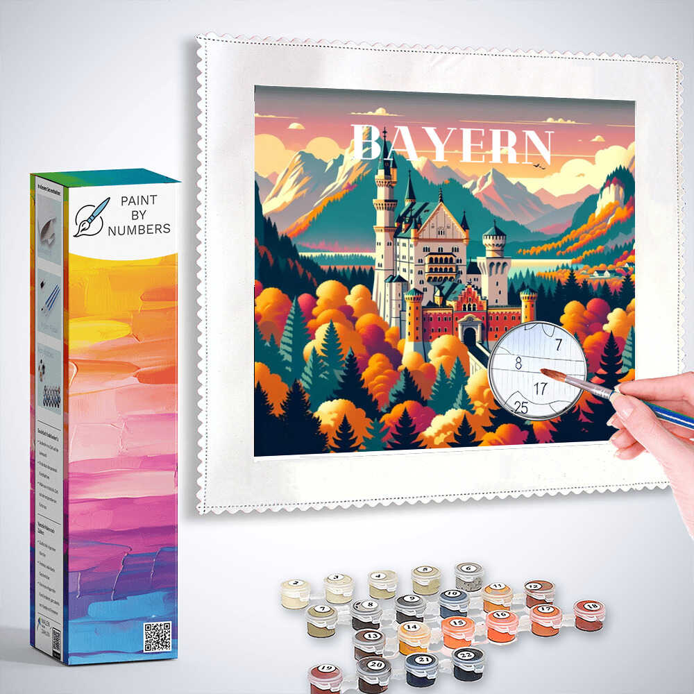 Paint by Numbers Bavarian Dreams kit featuring Neuschwanstein Castle, autumn forest, and Alps with painting supplies and hand in progress