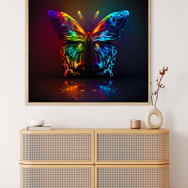 AB Diamond Painting - Butterfly Reflect displayed on wall above a wooden dresser, vibrant paint by numbers art with rainbow colors.