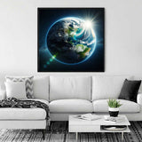 Paint by Numbers - Awakening of the Blue Planet artwork on a modern living room wall, depicting Earth with vibrant blues and greens.