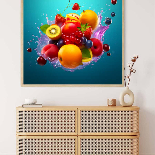 Diamond Painting of a vibrant fruit cocktail with blue background on a wall above a light wooden dresser
