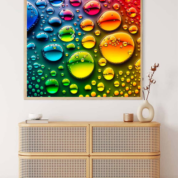 AB Diamond Painting - Colorful Raindrops on Canvas, Paint by Numbers Kit with Enhanced Acrylic Diamonds, hung above a stylish cabinet.