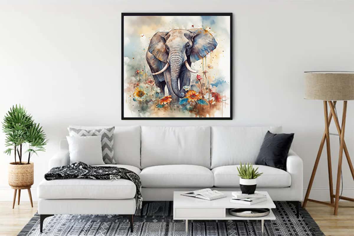 Majestic elephant diamond painting hanging above a modern white sofa in a stylish living room.