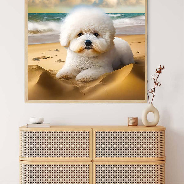 Diamond painting of a cute dog on the beach displayed above a modern wicker cabinet with decor items.