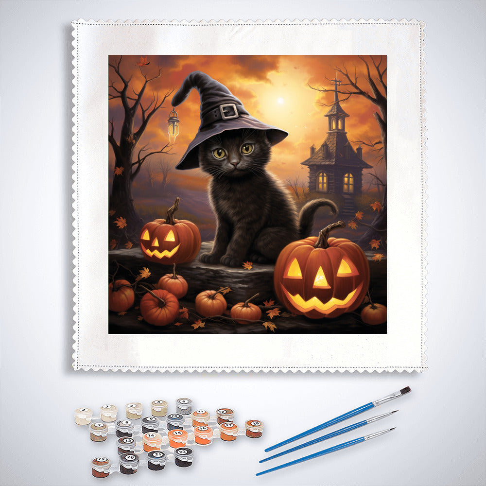 Paint by Numbers Witch Kitten with pumpkins and haunted house in background, complete paint set with brushes and palette displayed.