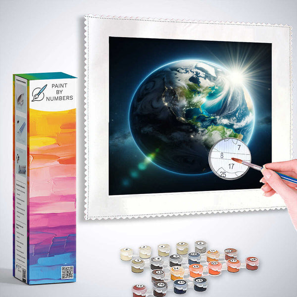 Paint by Numbers - Awakening of the Blue Planet kit with paintbrush, paints, and vibrant Earth artwork ready to be painted.