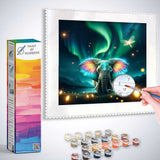 Paint by Numbers kit of an elephant with colorful ears under Northern Lights and fireflies with artistic tools
