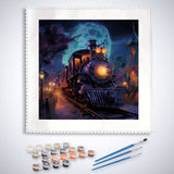 Paint by Numbers Ghost Train kit with brushes and paints featuring a spooky train scene at night.