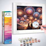 Paint by Numbers kit with fireworks scene, people in foreground enjoying vibrant display, with paints and brush included.