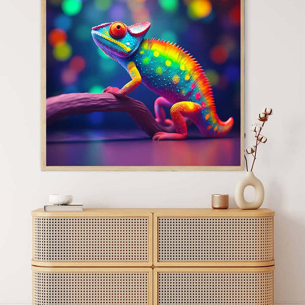 AB Diamond Painting of vibrant rainbow chameleon – paint by numbers art kit displayed on wall above modern cabinet.