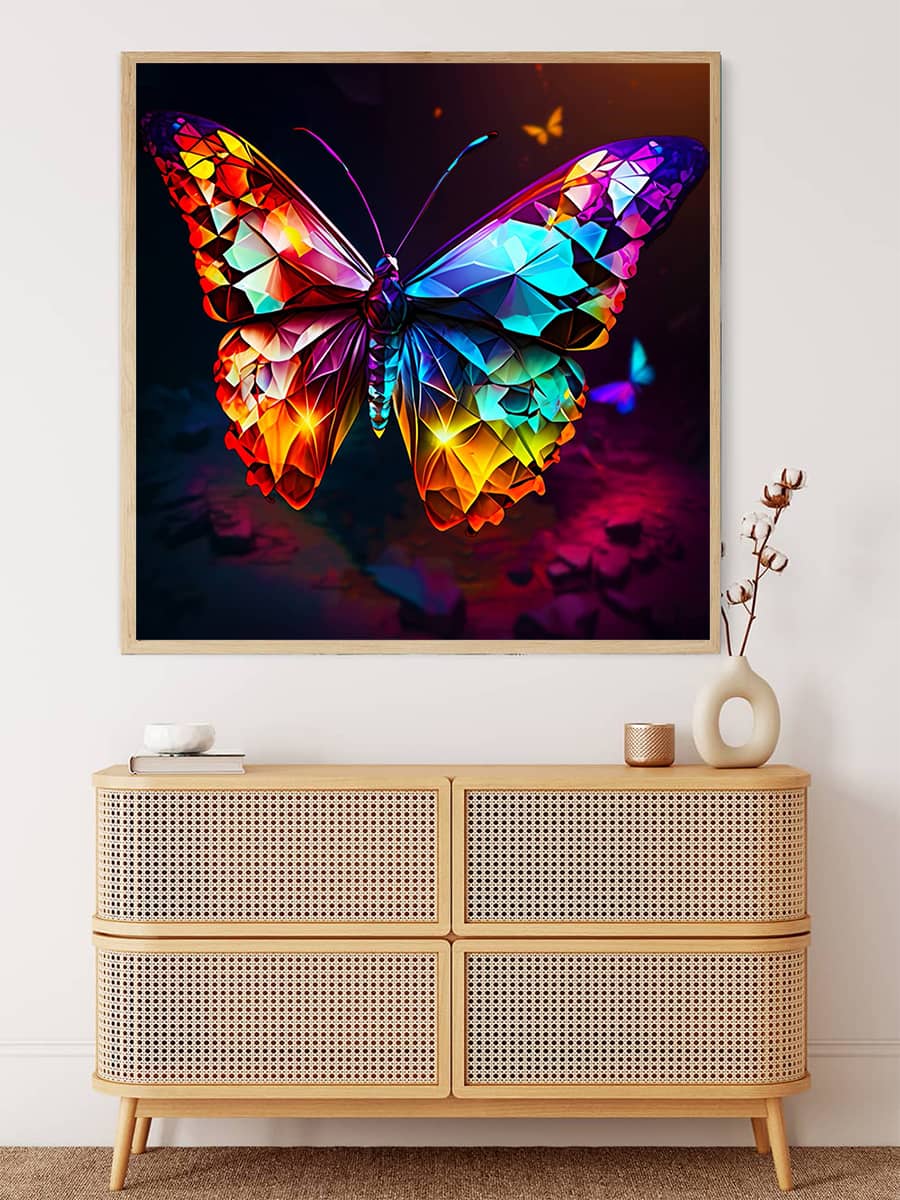 Colorful framed diamond butterfly painting kit displayed above a wooden chest, suitable for Paint by Numbers and art enthusiasts.