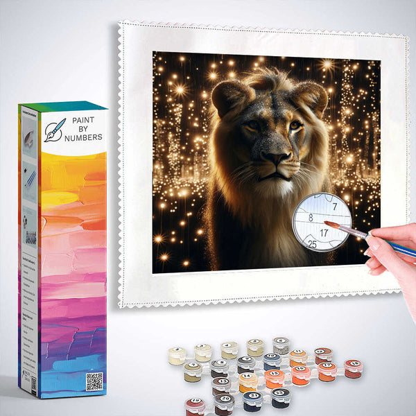 Paint by Numbers - Sternenmähne with lion surrounded by starry lights, showing paint kit and hand working on canvas