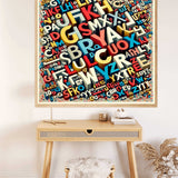 Paint by Numbers letter jungle artwork on wall above a wooden desk, showcasing a colorful jumble of letters in a dynamic 3D style.