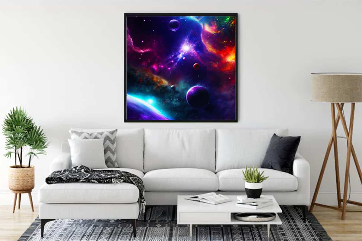 Diamond Painting Universe Exploration displayed above a modern white sofa in a contemporary living room. Paint by Numbers art.
