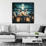 Moonlight Serenade Paint by Numbers painting above white sofa, featuring a Mediterranean beach scene with a candlelit table and starry night sky