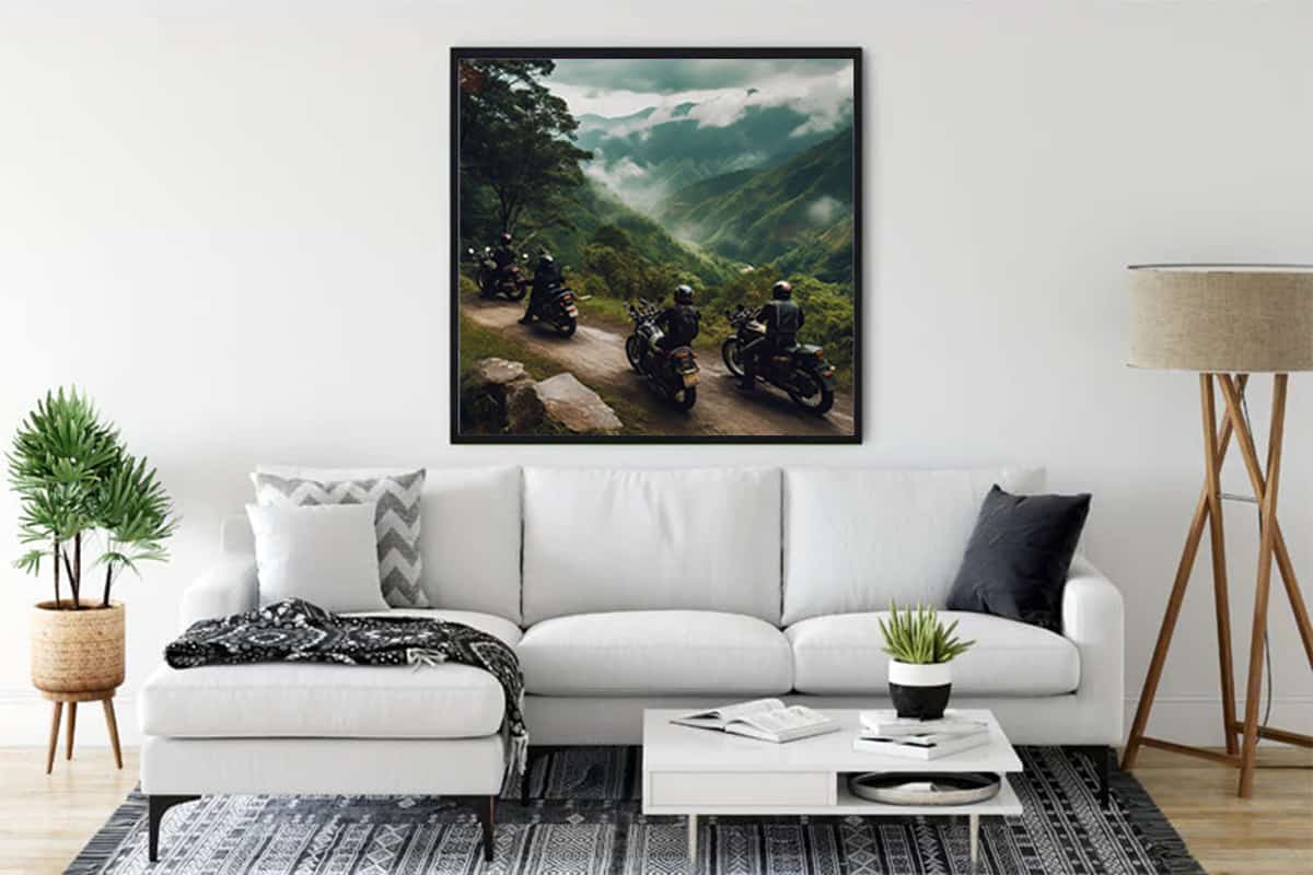 Motorcycle wall art featuring scenic mountain ride displayed in modern living room