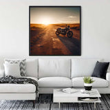 Motorcycle diamond painting on a racetrack hanging above a sofa in a modern living room.