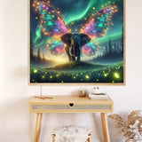 Paint by Numbers - Fairy dust and star travel art featuring an elephant with butterfly wings in a magical, green-lit forest.